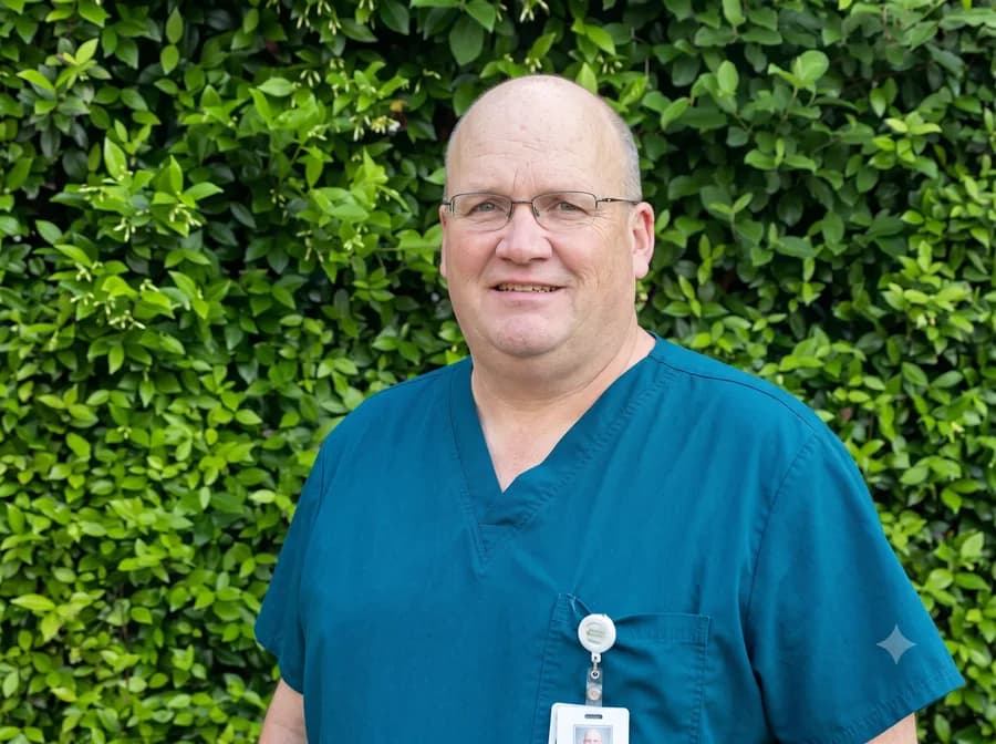Dr. Kelly Douglass, D.C., founder and chiropractor at Capstone Chiropractic Center